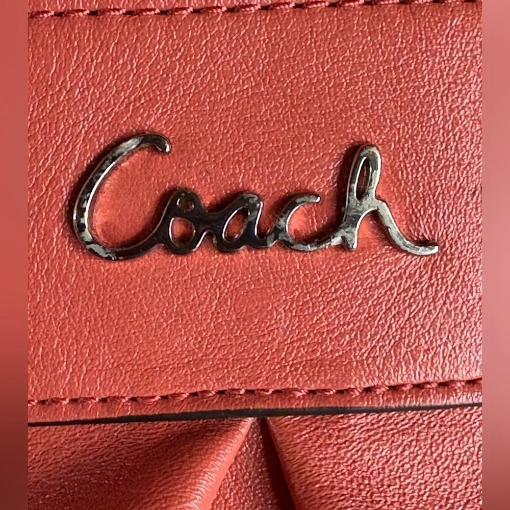 COACH women’s Coral salmon genuine leather crossbody purse NWOT silver hardware
